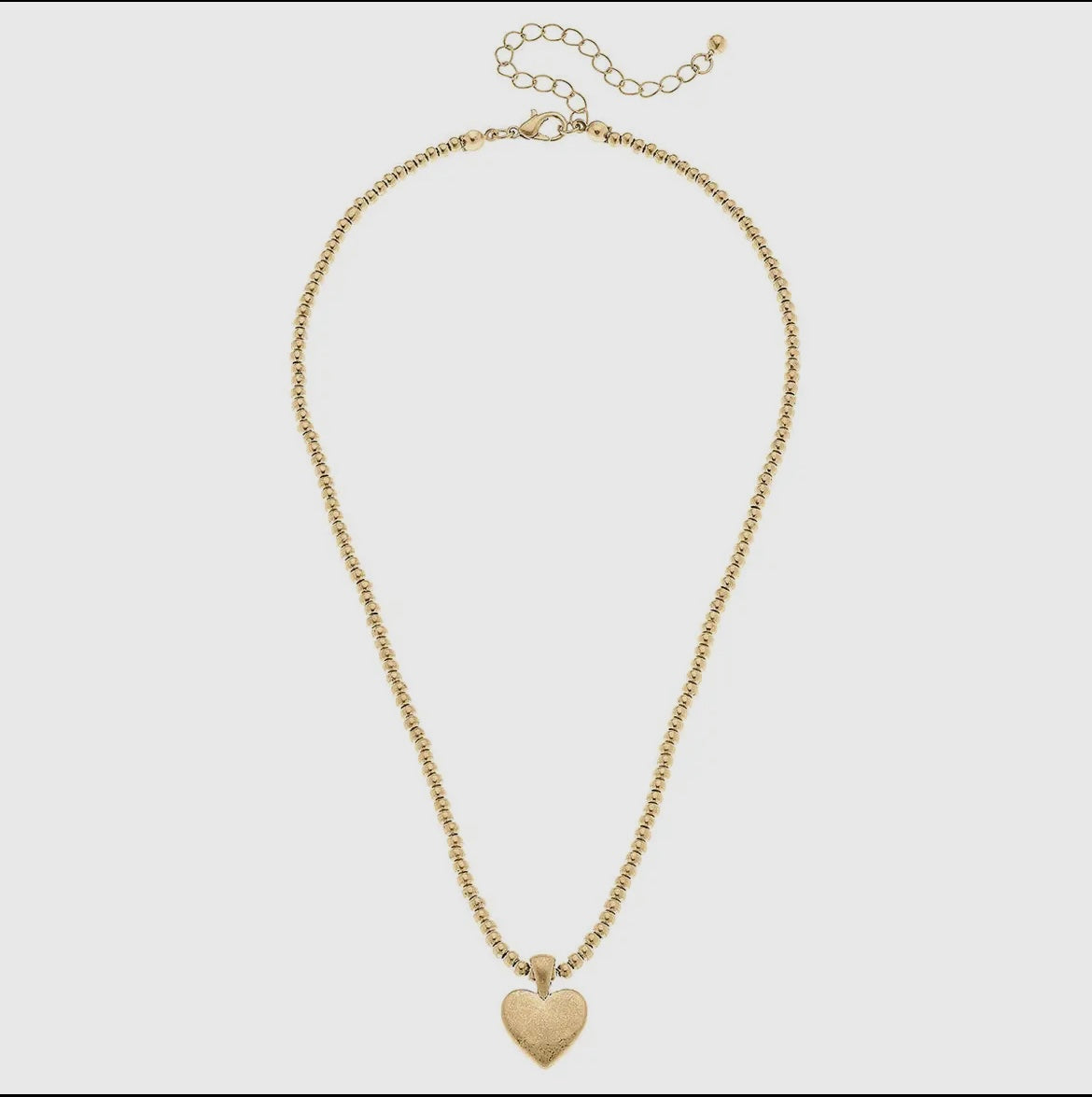 Gold Tone beaded necklace with gold heart by Canvas