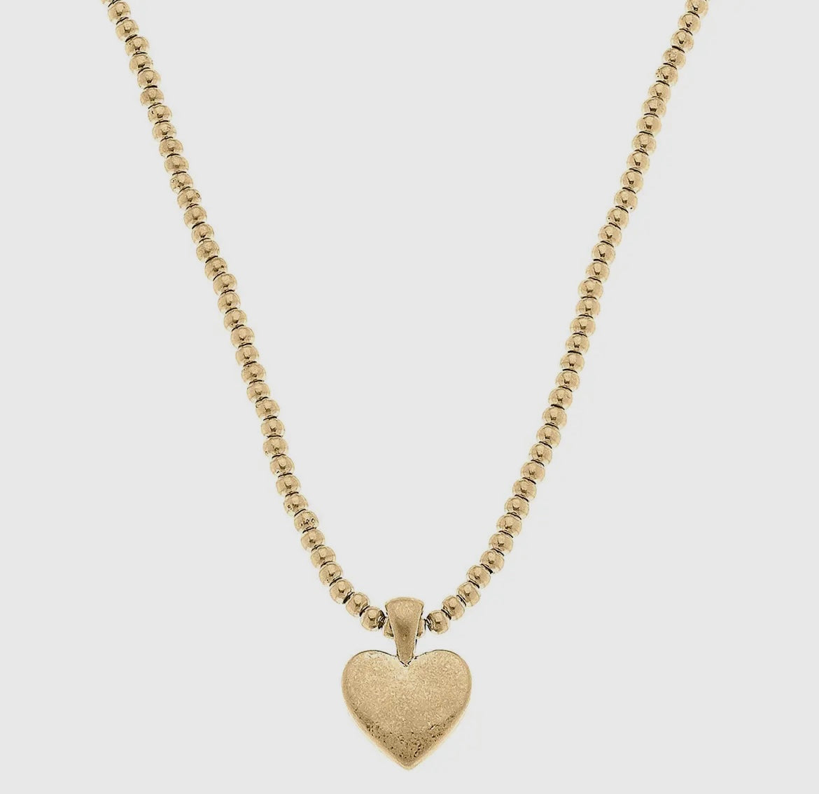 Gold Tone beaded necklace with gold heart by Canvas