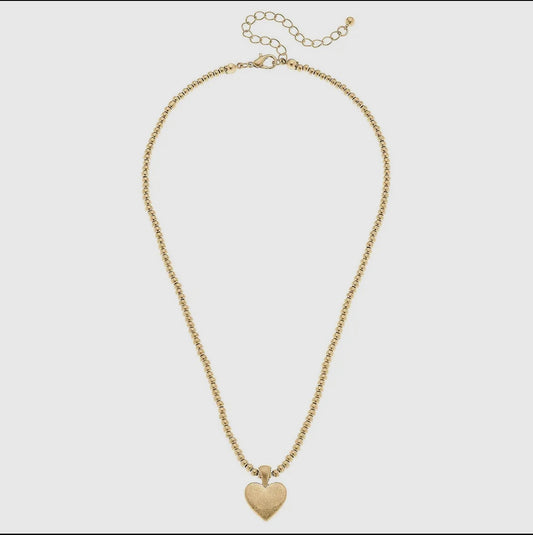 Gold Tone beaded necklace with gold heart by Canvas